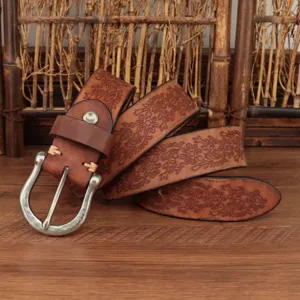Retro floral embossed genuine leather belt for men, thick top-layer cowhide detail view.
