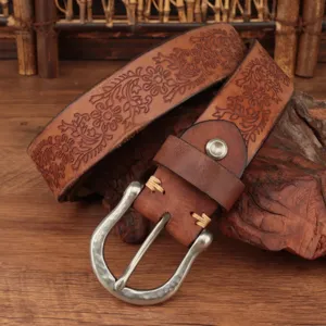 Vintage embossed genuine leather belt for men, stylish floral carved retro waist strap detail.