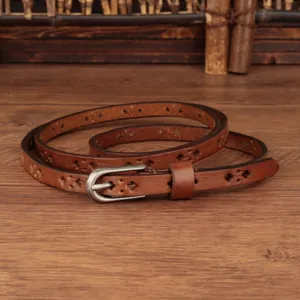 Vintage genuine leather thin belt for women with cross cutouts and metal buckle style.