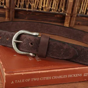 Genuine leather carved belt for men, retro brown distressed design, versatile vintage jeans accessory.