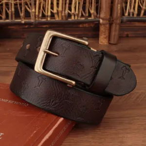 Vintage brown genuine leather belt for men with palm tree embossed pattern and brass buckle.