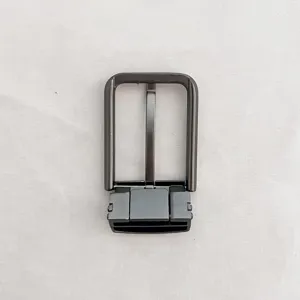 Close-up detail of dark metal men's business belt buckle accessory, durable zinc alloy material.