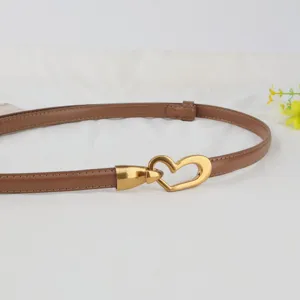 Brown leather women's belt with vintage gold heart buckle, perfect for dresses and coats.