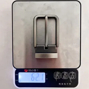 Metal belt buckle detail view, showing product weight and solid zinc alloy construction for men.