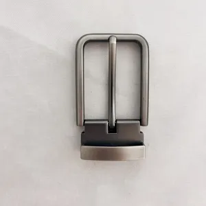 Closeup of metal belt buckle detail, zinc alloy pin buckle hardware accessory replacement.