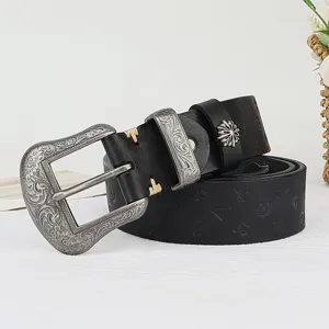 Vintage genuine leather belt for women with ornate engraved silver metal buckle and chic studs.