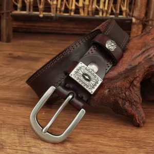 Women vintage leather belt with carved metal pin buckle stylish jeans waist belt detail shot