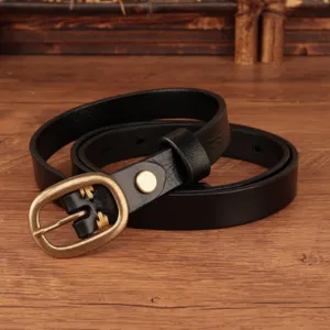 Detailed view of women's black genuine leather belt with vintage bronze pin buckle.