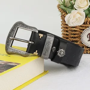 Vintage genuine leather belt for women with ornate floral carved buckle and stylish retro design.