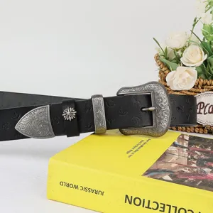 Vintage embossed genuine leather women belt with carved metal buckle and detailed strap design.