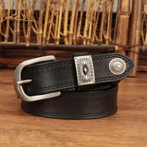 Vintage black leather women belt with retro silver buckle and decorative metal loop.