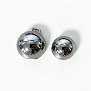 Detailed close-up of polished silver metallic ball buckle fastener for women belts