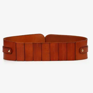 Close-up detail of wide brown leather belt women retro waist corset fashion accessory