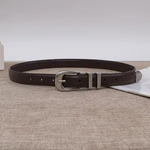 Women dark brown leather belt with vintage silver horseshoe buckle detail and metal loops.