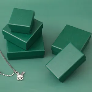 Elegant peacock green cardboard jewelry boxes in various sizes for rings and necklaces