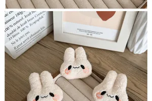 Close-up of soft plush rabbit heads for DIY craft accessories and decorations