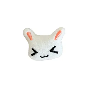 Adorable white plush cartoon rabbit head patch for DIY clothing and handmade bag decoration.