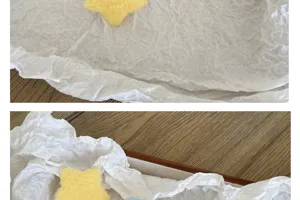 Vue rapprochée d'une étoile en peluche jaune douce pour les loisirs créatifs DIY