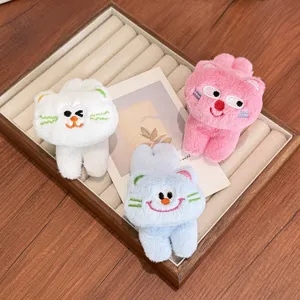Cute set of three 3D plush cartoon cat hair clips in white, pink, and blue colors