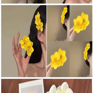 Vue détaillée de barrettes élégantes en fleurs de narcisse jaunes sur un modèle.