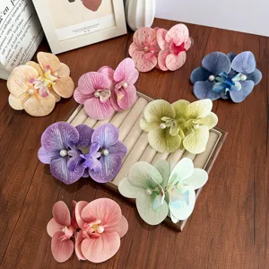 Elegant set of large artificial orchid flower hair clips in various vibrant colors for women