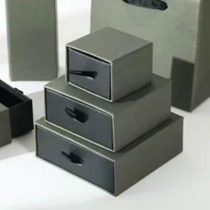 Green drawer jewelry gift boxes in three sizes with black pull ribbon