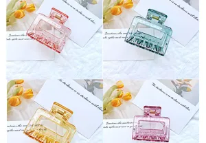 Four colors of minimalist hollow geometric hair claws in translucent jelly tones
