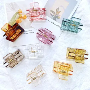 Elegant set of geometric hollow hair claw clips in transparent candy colors for women.