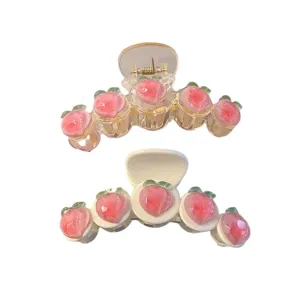Zweiteiliges Set mit süßen rosa Pfirsich-Haarklammern in transparent und cremeweiß