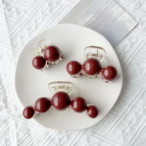 Elegant burgundy red spherical minimalist hair claw clips set in three sizes for women