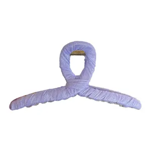 Lavender fabric-wrapped large hair claw clip for elegant and sweet hair styling.