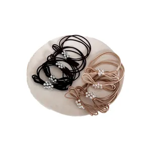 Elegant pearl bow hair ties with high elasticity and 3-in-1 design in black and beige