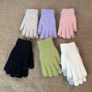 Detail view of women winter warm knitted gloves featuring diamond pattern and touch fingertips.