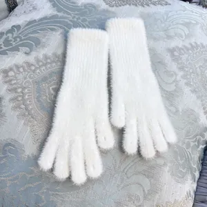 Longs gants en tricot pelucheux pour femmes, gants d'hiver chauds a doigts ouverts blancs.