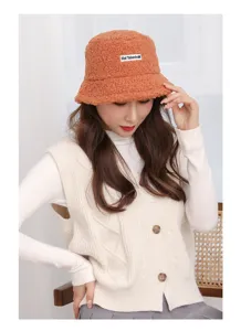 Autumn winter orange lamb wool bucket hat for women, cozy warm plush fisherman cap detail.