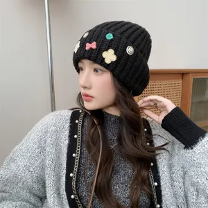 Cute knitted beanie for women, warm thick winter hat with sweet decorative charms and cozy fit.