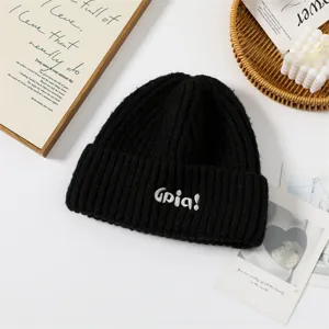 Black ribbed knit beanie for women, autumn and winter thick warm wool hat with stylish embroidery.