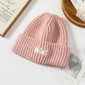Cute pink knitted beanie hat for women, thick warm winter woolen cap with cute embroidery.