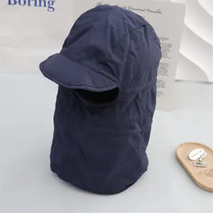 Dark blue windproof winter balaclava cap detail view, showing soft fabric and short brim design.