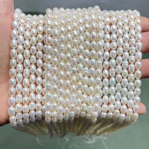 Close-up of 5mm high-luster natural freshwater pearls strands for DIY jewelry