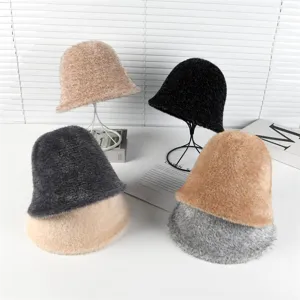 Detailed view of fluffy plush bucket hats in multiple colors displayed on stands and table.