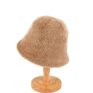 Fluffy brown bucket hat for women, warm plush winter hat, stylish casual outdoor headwear.