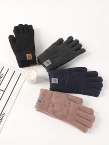 Winter warm knit gloves detail showing multi-color options, soft touch and cozy design.