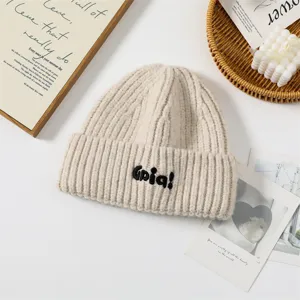 Beige knit beanie hat for women, cute embroidered letter winter warm thick wool cap.