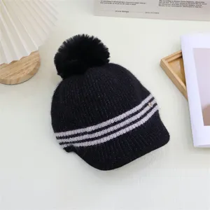 Cozy black knitted beanie hat with stylish grey stripes, fluffy pom-pom, and warm woolen material for winter.