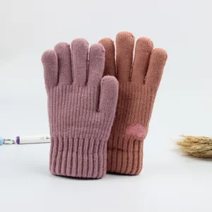 Winter warm thick knitted gloves for women, fleece lined thermal mittens with cute heart pattern.