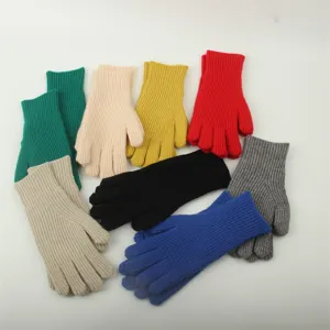 Colorful winter knit gloves for women, warm five-finger gloves in various vibrant shades.