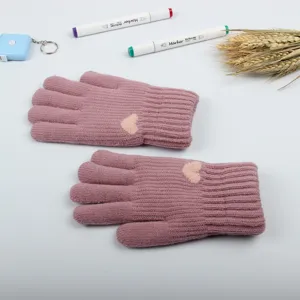 Women winter warm knitted gloves, thick double layer fleece lined design with cute heart detail.