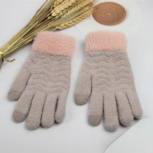 Winter women's touchscreen knit gloves with pink plush cuffs, warm and stylish for cold days.