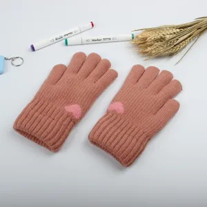 Thickened winter knitted gloves for women, warm fleece-lined design with cute pink heart detail.